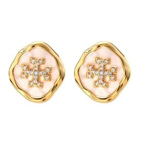 Tory Burch Gold and white Stud Earrings
